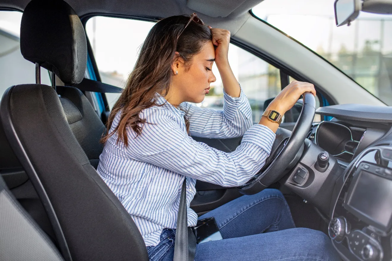 An image containing car, person, chair, car seat